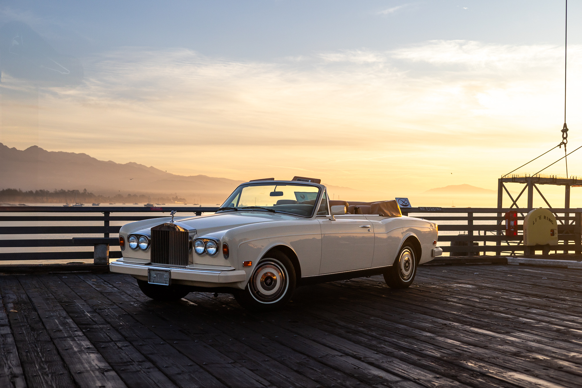 White Rolls Royce sunset