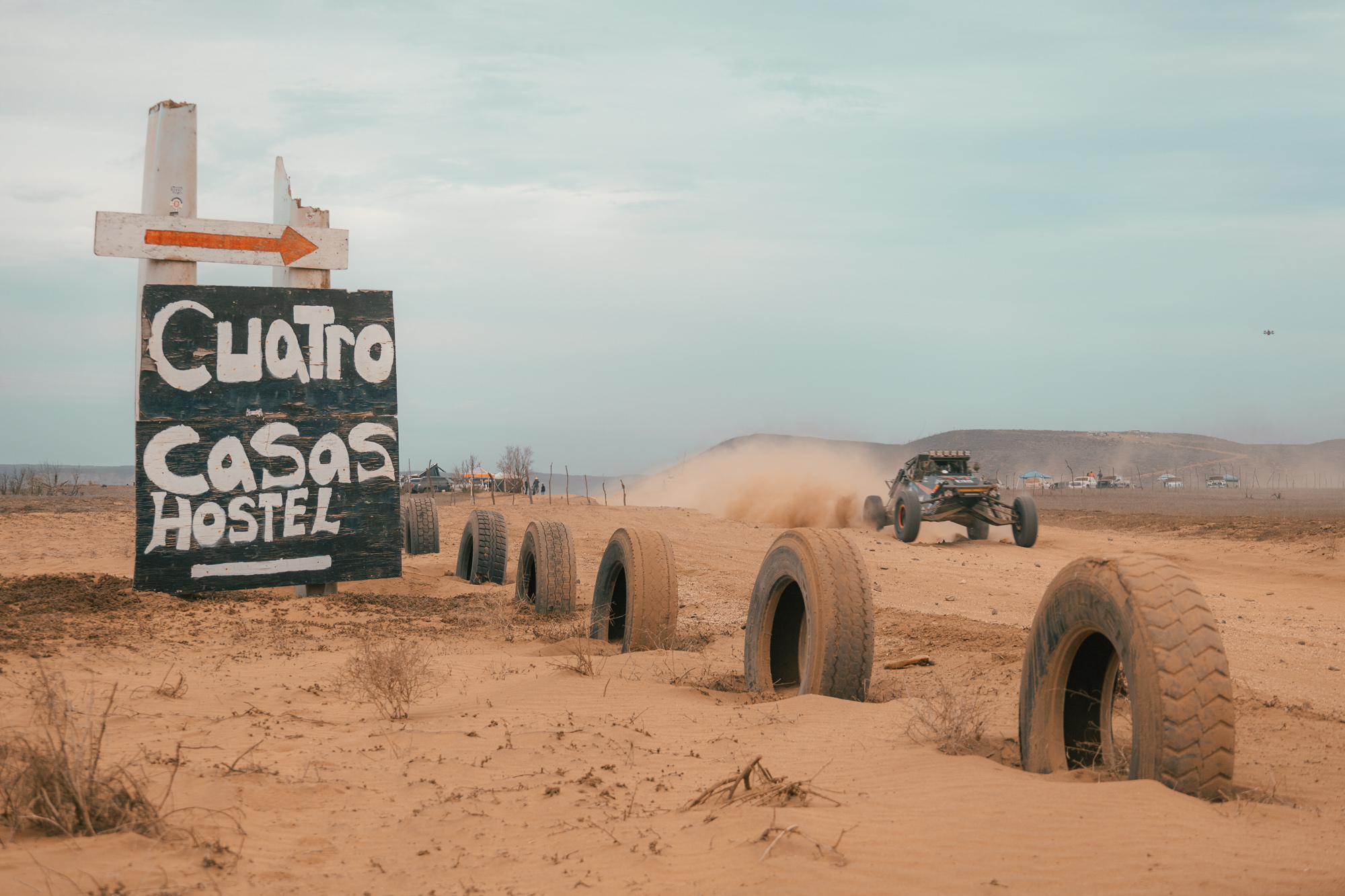 Race at Baja sign